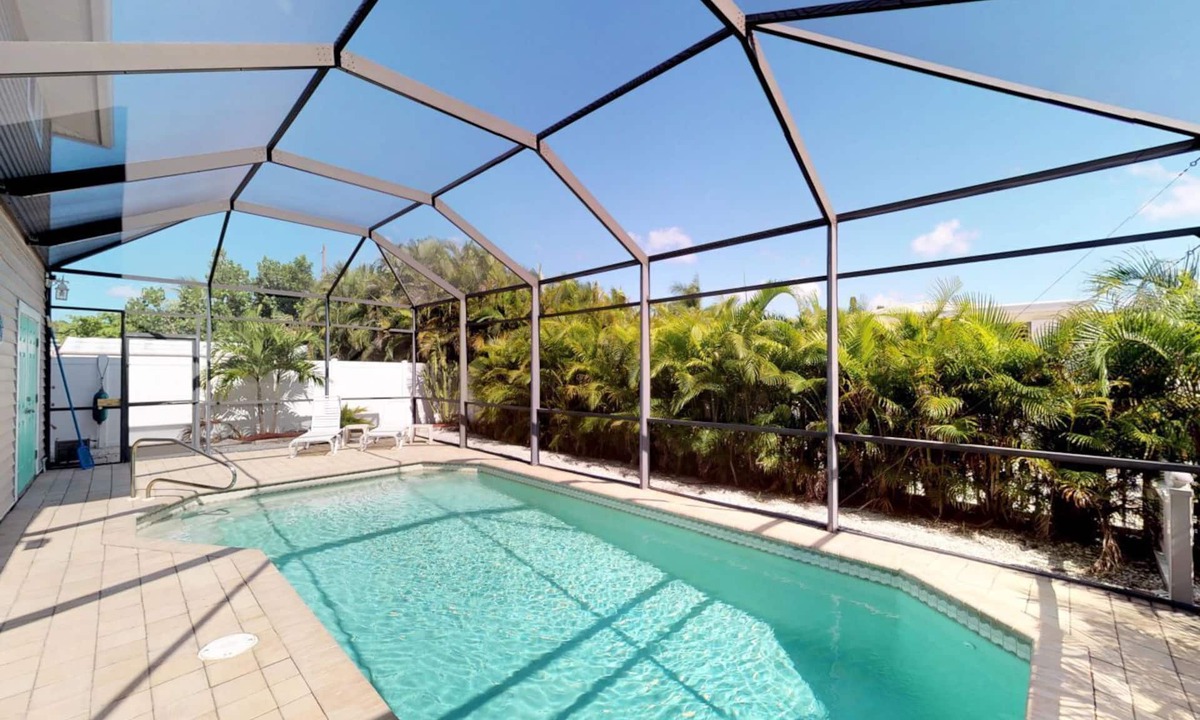 Mid Island House | 4851 Estero Blvd - Spacious Pool Home Across from Beach!
