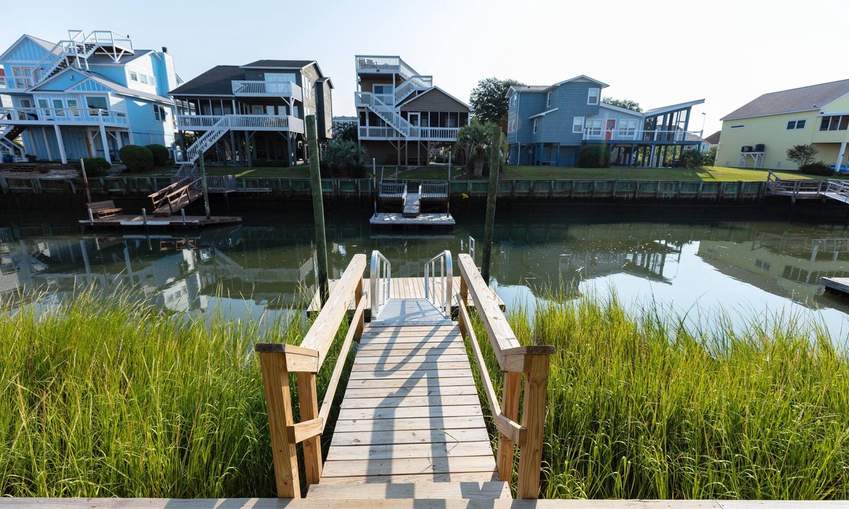 Sunset Beach House | 5 Star Sunset Beach canal home - Kayak, paddleboard, bring your boat & jetskis