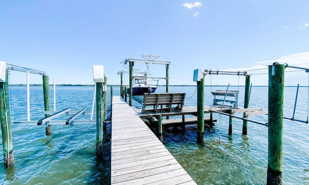 Alligator Point House | BEACH FRONT to BAY with boatdock, swimming pool, pickleball courts and kayaks.
