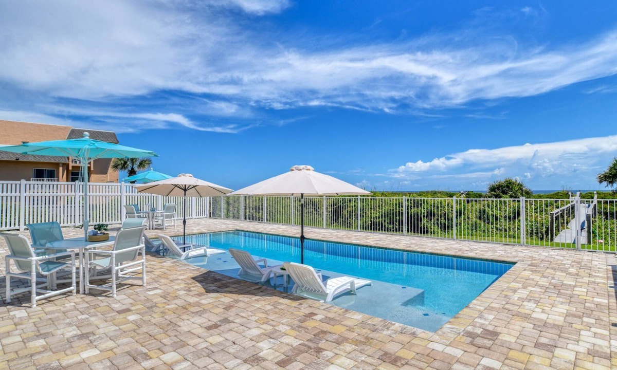 Butler Beach Apartment | BEACHFRONT NEW Heated POOL, Oceanfront Porch and View from Entire Living Space! Private Beach Access