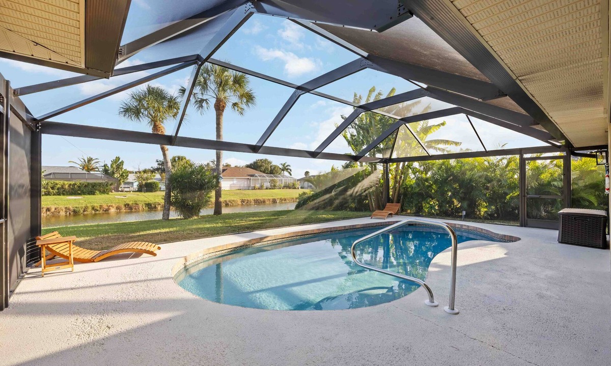 Pebble Beach House | Canal-Front Pool Home near Gulf Beaches & Golf + exclusive local perks!