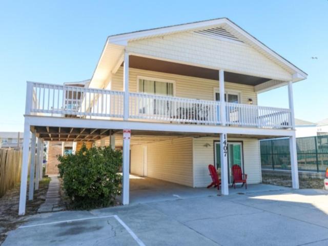 Carolina Beach Apartment | Carolina Ease - The perfect condo for an easy beach getaway - large deck and just steps to the beach! apts