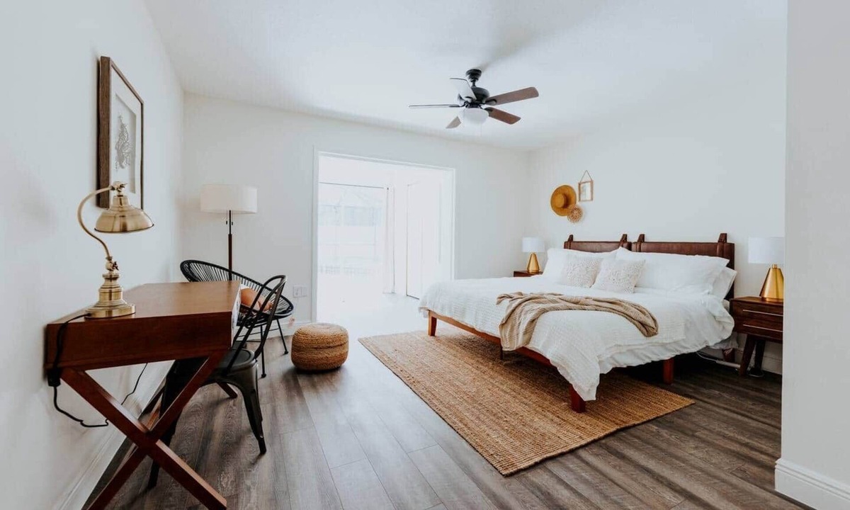 Palma Sola House | COQUINA HAUS stylish home steps away from private Bay inlet!