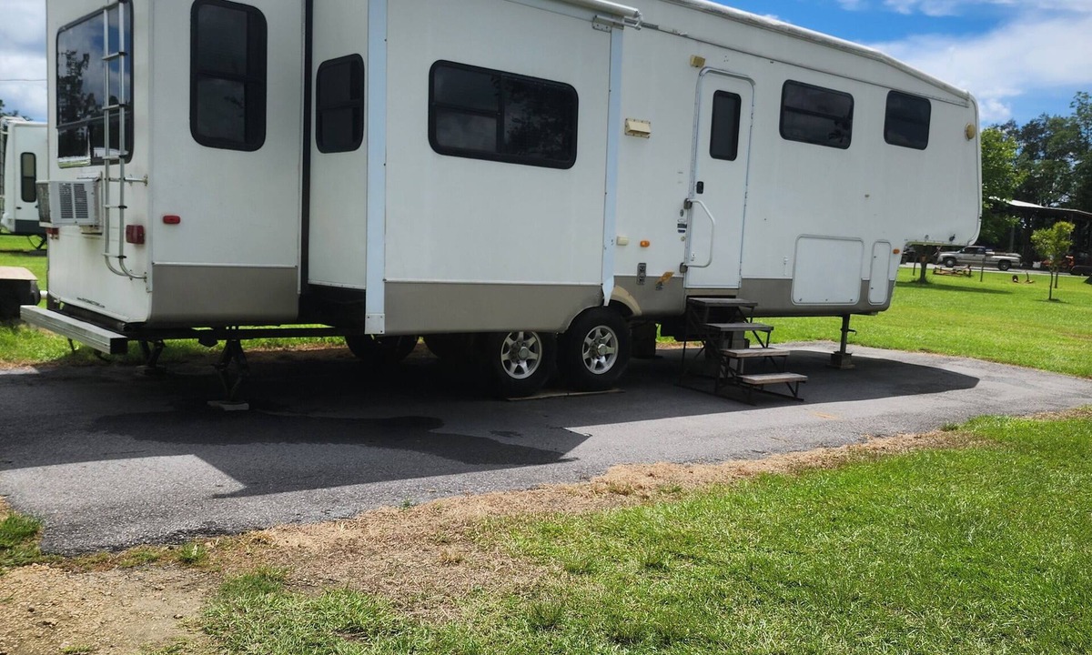 Cottondale RV Rental | Cougar RV in beautiful camp ground.