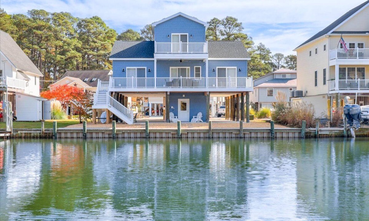 Captain's Cove House | Custom waterfront home with elevator by Seaside Vacations & Sales