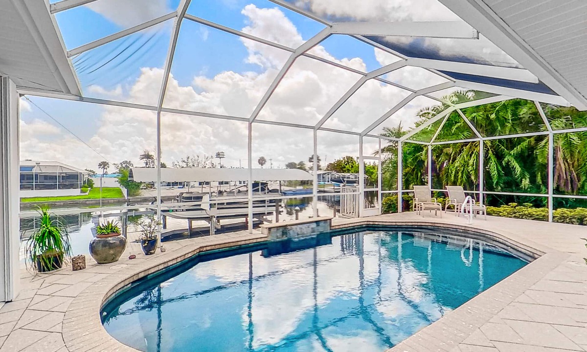 Matlacha Isles House | Dog-friendly waterfront home with heated pool, lanai, central AC, & W/D