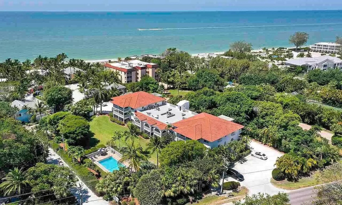 Sanibel Condo | End unit with extra windows. Steps to the beach, private beach access!