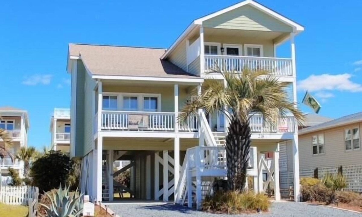 Holden Beach House | Experience coastal bliss at Reel Blessed, a spacious 4-bedroom haven in Holden Beach.