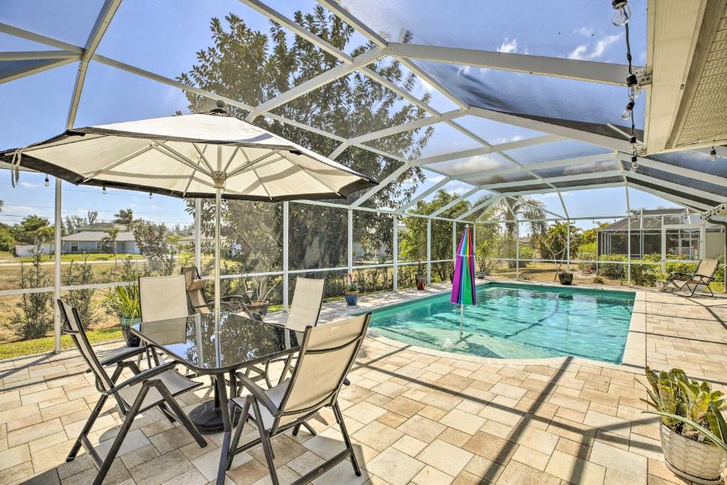 Trafalgar House | Lanai and Heated Pool Stunning Cape Coral Getaway