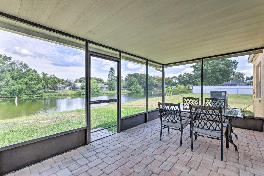 Trailer Estates House | Lanai and Pond at Tranquil Bradenton Retreat!