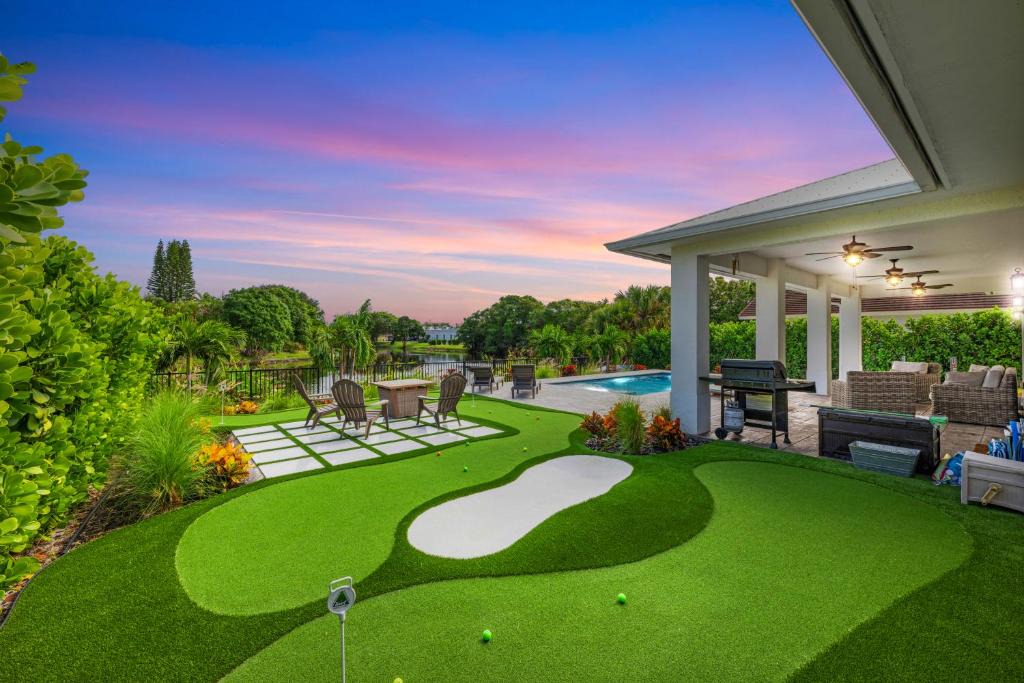 Jensen Beach House | Mini Golf Course*Heated Saltwater Pool*Lakeview!