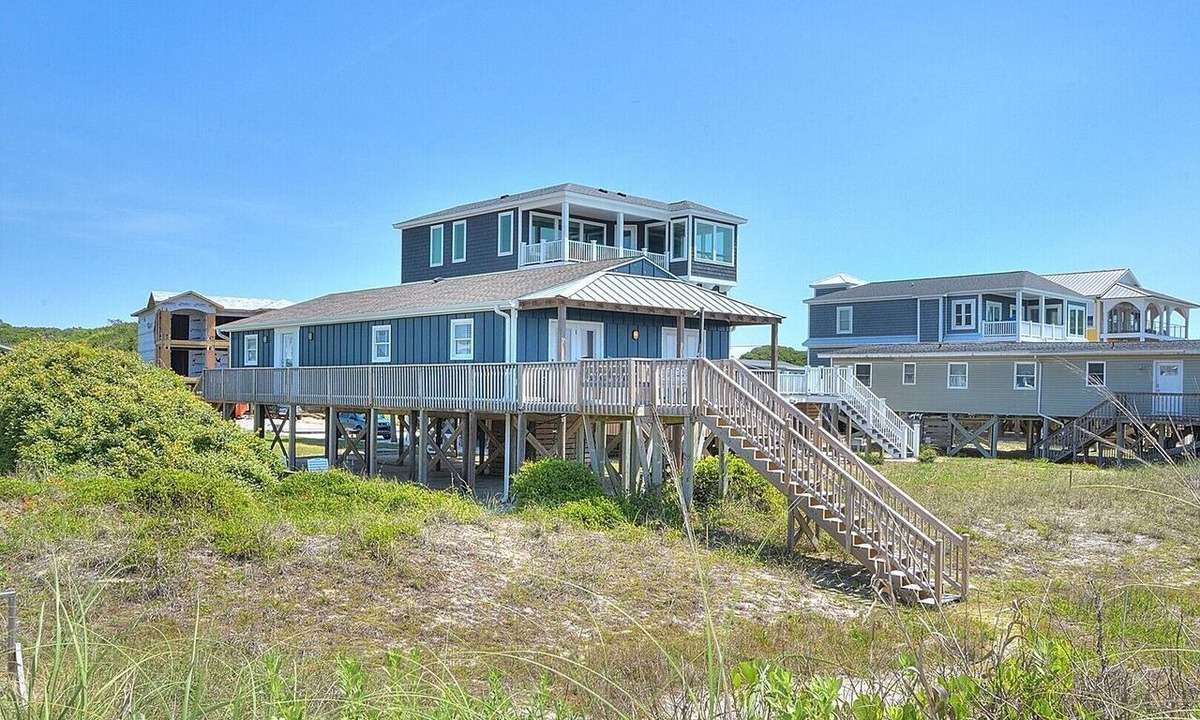 Yaupon Beach Hotel | Oceanfront Knotty Pelican in Oak Island: 5 beds, sleeps 12, pet-friendly retreat!
