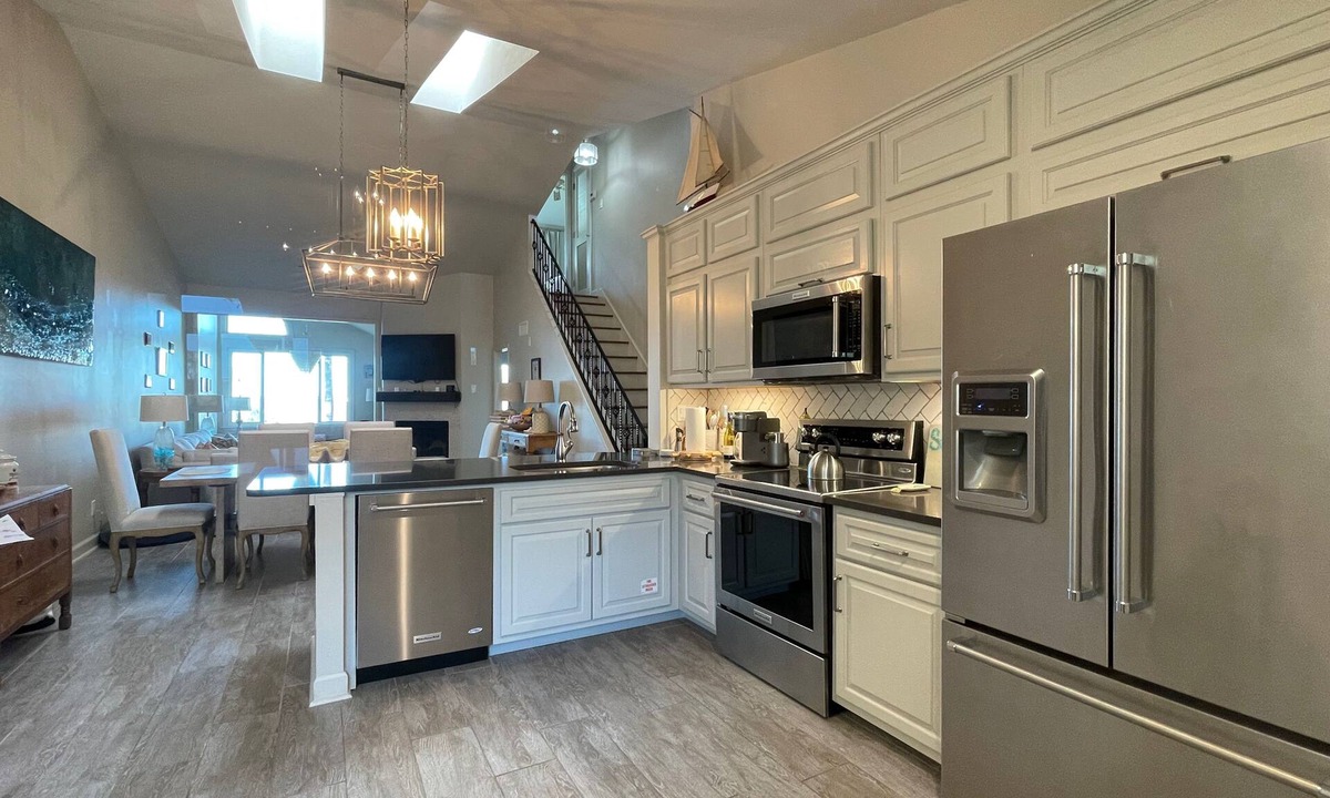 Sandestin Condo | Perfectly located home with golf cart, open layout, smart TVs, W/D, & pools