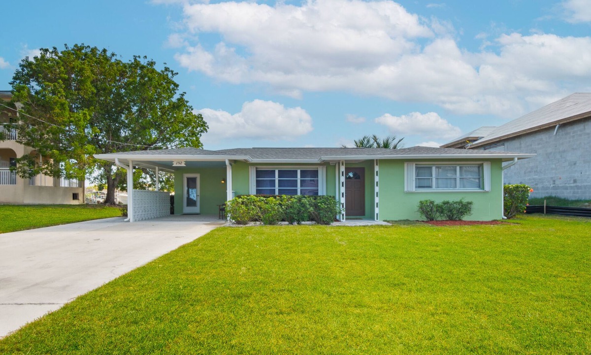 Isles of Capri House | Pet and kid friendly Key Lime Cutie with dock for 22' boat, walk to restaurants.