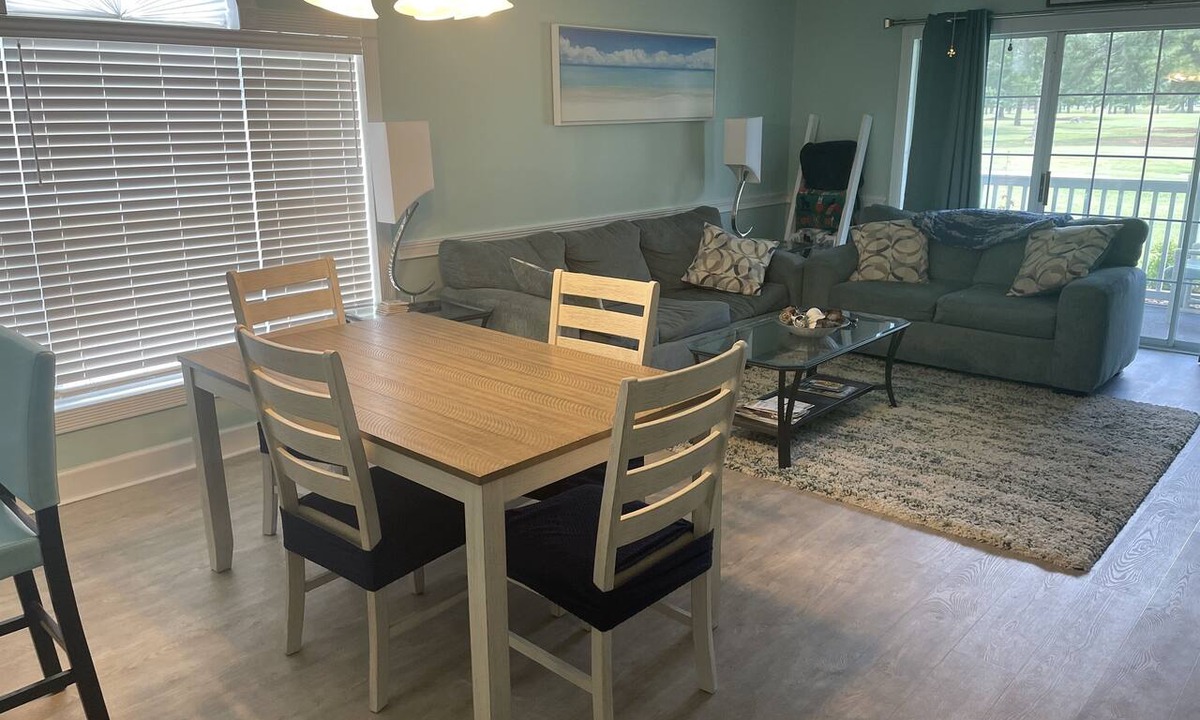 Central Myrtle Beach Condo | Pet Friendly 2 BR - Golf Course View! 1st Floor with screen door off back porch