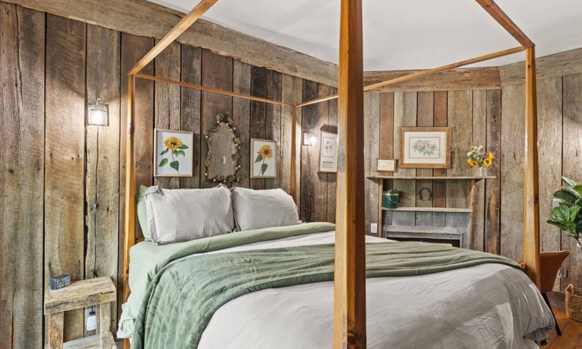 Townsend Hotel | Rustic Comfort Room - Wood Paneling and Fireplace
