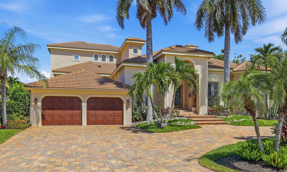 Sarasota House | Serenity Cove- 4 BR/3 BA Canal Front Home by RVA