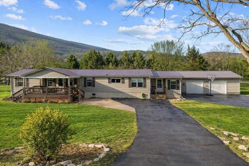 Cabins House | Single-level River Access Fire Pit & Game Room