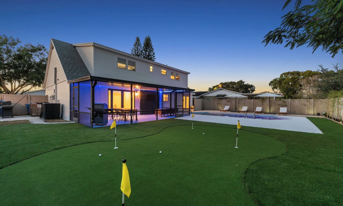 Bay Crest Park House | Spacious & Relaxing Tampa Escape w/Heated Pool, Minigolf, Firepit