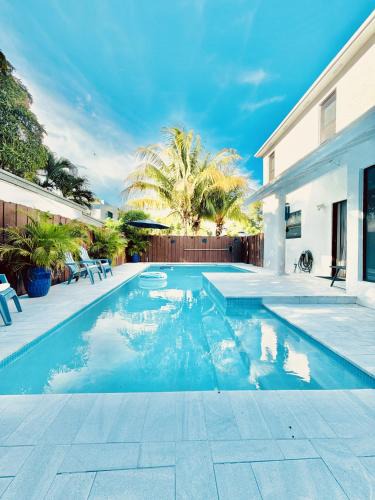 Coral Way House | Stay Central: Relax in Our Heated Pool Oasis