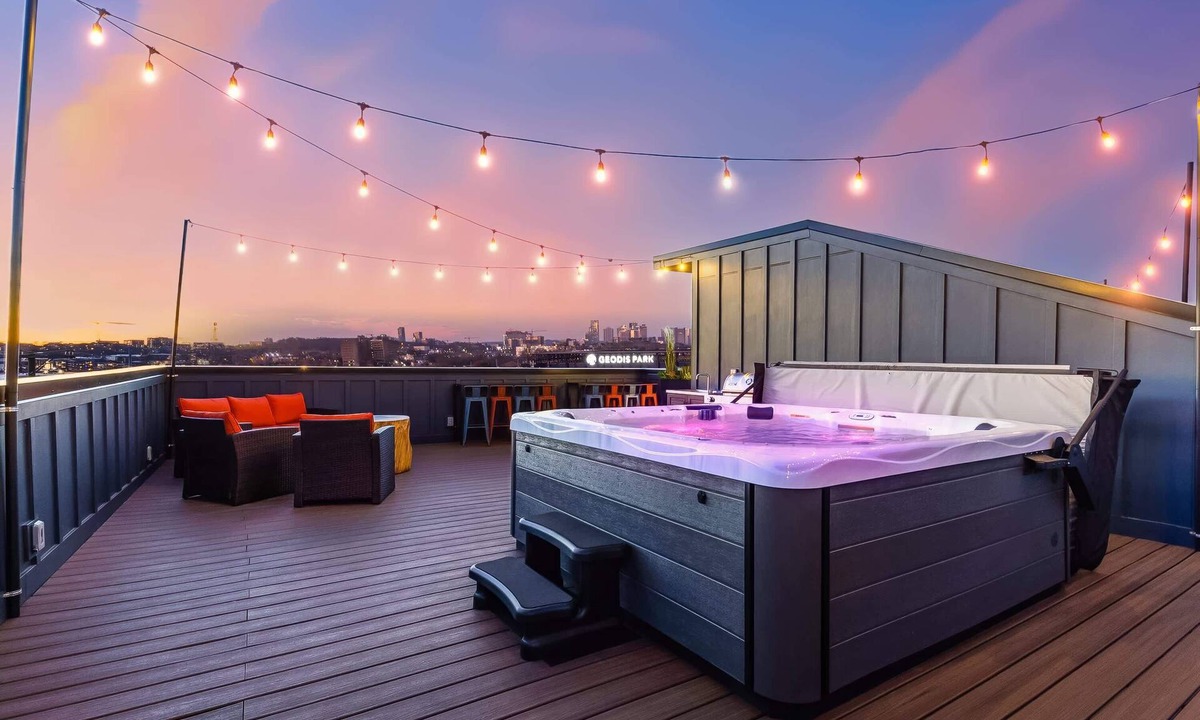 Hurwood Heights House | Summer rooftop hot tubs, sauna, game rooms near Geodis Park & Broadway