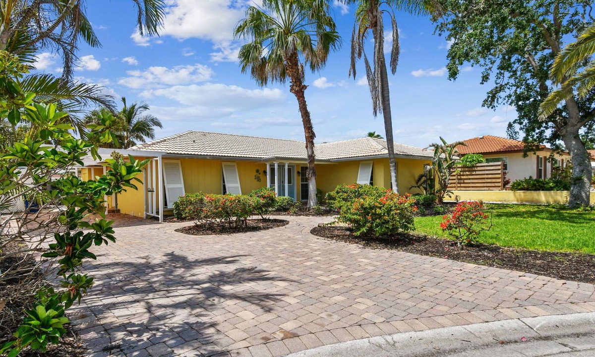 Siesta Key Village House | Sunnyside Up Cottage - Walk to Siesta Beach, Waterfront Home by Gulf Coast Holiday Homes