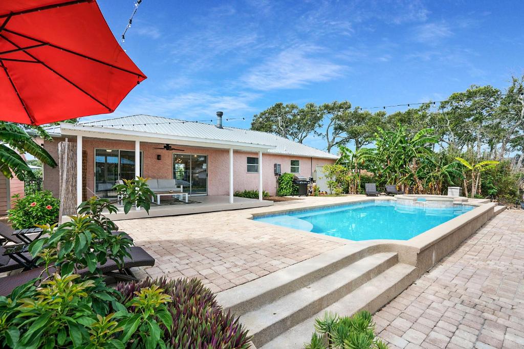 Butler Beach House | Walk to Beach, Pool, Hot Tub, Dock, GAMES!