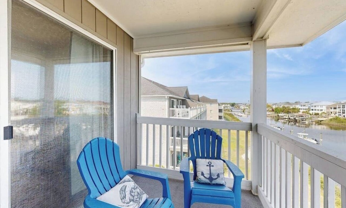 Carolina Yacht Landing Condo | Waterfront condo with pool, private balcony, close to beach & golf