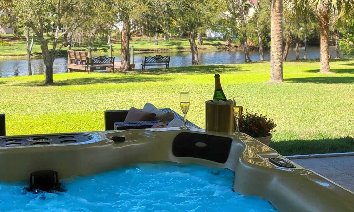 Indian Trails House | Waterfront with Dock on Private Half-acre with Hot tub and Pool