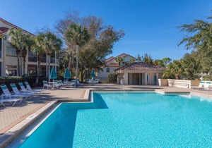 3BR Poolside Villa w/6-Seat GOLF CART! Screened Porch, Near Beach, Pool, Tram