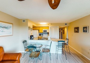 Coastal retreat with private balcony, pool, & easy beach access