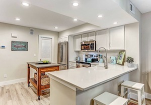 Completely Remodeled Condo with Modern Kitchen & WiFi - Steps to Beach/Pool