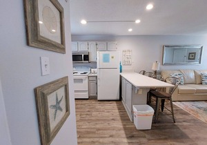 Cute, beach side condo! Sunrise Village 117 | Easy Beach Access | Updated Interior | Pool