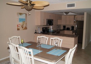End unit with extra windows. Steps to the beach, private beach access!