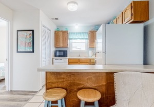 Gulf-front getaway just steps from the sand with free WiFi, AC, deck, & pool