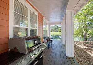Lakeside Cottage with TWO golf carts! Back Porch, Pool & Hot Tub, Beach Tram.