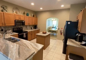 Overlooking the golf course with spacious interior!