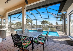 Panoramic Gulf Access +Heated Pool +Screened Lanai