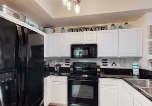 Richly designed beachfront condo with pools, hot tub, gym & amazing views