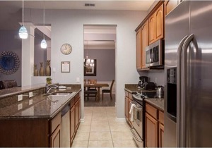 Spacious Condo w/Private Covered Balcony, Gourmet Kitchen, & Free WiFi