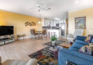 Stylish first-floor condo with water views & easy beach access