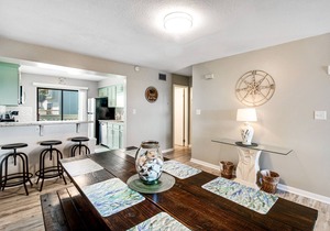 Stylish townhome with sound view, W/D, & HEATED community pool