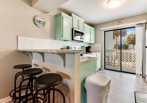 Stylish townhome with sound view, W/D, & HEATED community pool