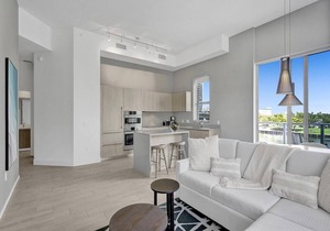 This Amazing 2-bedroom corner unit boasts breathtaking views and sleek luxuryrn design
