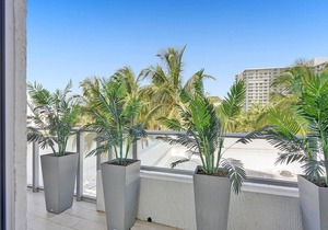 This Amazing 2-bedroom corner unit boasts breathtaking views and sleek luxuryrn design