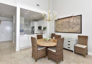 This beautiful unit has front row seats to the sunrise! Direct bayfront!