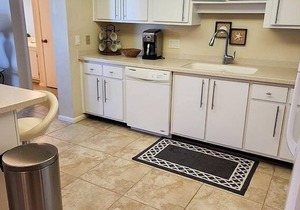 This penthouse vacation rental condo boasts 1400 sq. feet of living area and.