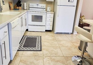 This penthouse vacation rental condo boasts 1400 sq. feet of living area and.