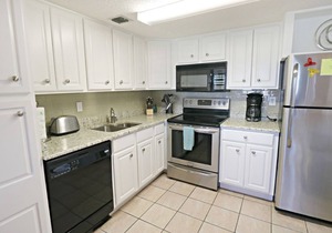 Updated, Ground Floor, STEPS from the Beach, Pool, Boat Ramp and Fishing Pier on