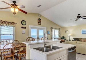 Updated Home with Covered Porch to Enjoy the Ocean Breezes and Sound of the Waves!